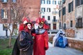 Venice, Italy - February 10, 2018: People in masks and costumes at the Venice Carnival