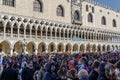 Venice, Italy crowd gathered for the Venice Carnival outside Doges Palace. Royalty Free Stock Photo