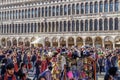 Venice, Italy crowd gathered for the Venice Carnival at Saint Mark square. Royalty Free Stock Photo