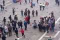 Venice Italy elevated day view of street vendor selling hats and carnival masks, with tourists on Saint Mark Royalty Free Stock Photo