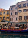 Venice, Italy - February 2019: Floating market in Venice, Italy Royalty Free Stock Photo