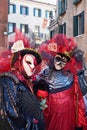 Venice, Italy - February 10, 2018: People in masks and costumes at the Venice Carnival
