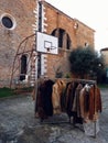 Venice, Italy - February 2019: Small and vintage market in a basket court inside a school, in Cannaregio, Venice