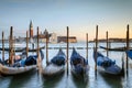 Venice, Italy - gondolas moored on the San Marco basin, in the background the church of San Giorgio Maggiore Royalty Free Stock Photo