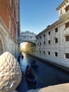 Venice, Italy. Gondolas in a romantic narrow canal. Bridge of sighs