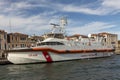 Coast guard ship in Venice, Italy ready for emergency start at the pier in Venice, Italy