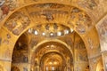 Golden wall mosaic inside St Mark`s Basilica or San Marco in Venice. It is top landmark of Venice Royalty Free Stock Photo