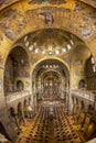 Golden wall mosaic inside St Mark`s Basilica or San Marco in Venice. It is top landmark of Venice Royalty Free Stock Photo