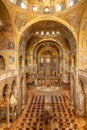 Golden wall mosaic inside St Mark`s Basilica or San Marco in Venice. It is top landmark of Venice Royalty Free Stock Photo