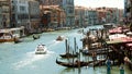 VENICE, ITALY - JULY 7, 2018: Grand Canal, ancient houses of Venice, hot summer day. traditional Venetian boats Royalty Free Stock Photo
