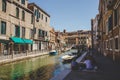 Venice, Italy - July 14th, 2017.Venice cityscape, narrow water canal, bridge and traditional buildings. Italy