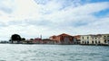 VENICE, ITALY - JULY 7, 2018: view from the sea to the Venetian islands. blue sea, sky, summer day. Burano, Murano, San Royalty Free Stock Photo