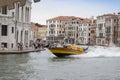 Venice, Italy - June 30, 2017: Carabinieri police boat speeds along the Grand Canal of Venice, Italy Royalty Free Stock Photo