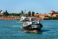 Ferry Boats with Tourists in Motion in the Venice Lagoon - San Michele Island