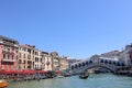 Venice, Italy, 11. June 2022: A Gondola, Canal Grande and Rialto Bridge in Venice, Italy. Royalty Free Stock Photo