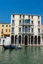 Venice, Italy - 30 June 2018: the gondolas parked along the grand canal in Venice, Italy Royalty Free Stock Photo