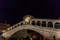 Venice, Italy - 30 June 2018: Night at Rialto bridge over the grand canal in Venice, Italy Royalty Free Stock Photo