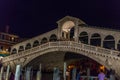 Venice, Italy - 30 June 2018: Night at Rialto bridge over the grand canal in Venice, Italy Royalty Free Stock Photo