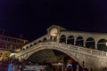 Venice, Italy - 30 June 2018: Night at Rialto bridge over the grand canal in Venice, Italy Royalty Free Stock Photo