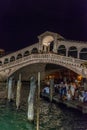 Venice, Italy - 30 June 2018: Night at Rialto bridge over the grand canal in Venice, Italy Royalty Free Stock Photo