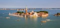 Venice, Italy - June 27, 2014: Panoramic view from St. Mark's Campanile on island and church of San Giorgio Maggiore Royalty Free Stock Photo