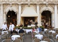 Venice, Italy - June 07, 2017: People in cafe on San Marco square in Venice. Royalty Free Stock Photo