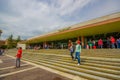 VENICE, ITALY - JUNE 18, 2015: Tourists and passengers waitting outside of Venice airport, crowded airport in summer