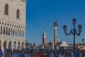 Tourists on San Marco square with views of Church of San Giorgio Maggiore