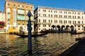 Grand canal, people enjoy gondola trip. Palace Fondaco dei Tedeschi Royalty Free Stock Photo