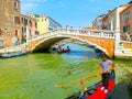 Venice, Italy - June 06, 2015: Unidentified man rows gondola on June 06, 2015 in Venice, Italy.