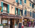 VENICE, ITALY - JUNE 15, 2016 View to little cafe `Trattoria bella Venezia`