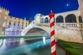 Venice, Italy with light trails on the Grand Canal passing under the Rialto Bridge Royalty Free Stock Photo