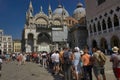 Venice, Italy: Long queue of tourists in order to get entry at famous main attraction St Mark s Basilica, it