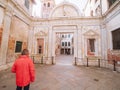 Venice, Italy - 17.10.2023: Male tourist looking at stunning architecture of the city. Travel and sightseeing. Exploring old