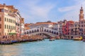 Venice, Italy - March 27, 2019: Beautiful vivid view of the famous Rialto Bridge Ponte Di Rialto over the Grand Canal Royalty Free Stock Photo