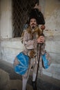 Venice, Italy - March 3, 2019: Man dressed as Venetian carnival in San Marco Square Royalty Free Stock Photo