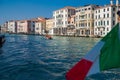 VENICE, ITALY - March 24, 2019: Stunning colorful medieval buildings,narrow canals with markets, gondolas in the best