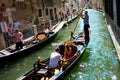 Venice, Italy - 20 , 2019: Marriage proposal on a gondola. romantic couple promising love and showing ring in venetian channel on