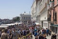 Crowd of people on Riva degliSchiavoni, Venice waterfront promenade