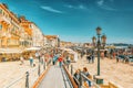 VENICE, ITALY - MAY 12, 2017 : Embankment of the Grand Canal with tourist near  Doge`s Palace and S.Marco square , Italy Royalty Free Stock Photo