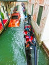 Venice, Italy - May 04, 2017: gondola sails down the channel in Venice, Italy. Gondola is a traditional transport in