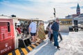 Group of senior tourists getting off from the ACTV vaporetto at San Zaccaria station in Venice Royalty Free Stock Photo