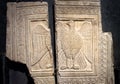 Image of eagle carved in stone wall, detail of interior of St Mark`s Basilica or San Marco in Venice