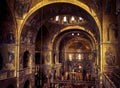 Inside famous San Marco or St Mark`s Basilica, it is top tourist attraction of Venice. Golden mosaic interior of ornate San Marco