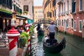Italy, walk in traditional gondola on canal of Venice Royalty Free Stock Photo