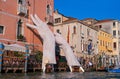 Venice, Italy - 07 May 2018: The scenic monumental sculpture of a child`s hands called -Support- by Lorenzo Quinn