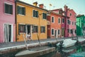 Senior local man relaxing in the morning . Local traditional scene from Burano, Italy