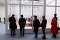 Spectators looking the installation by Sun Yuan e Peng Yu titled Can`t Help Myself exposed at the Central Pavilion during the 58t