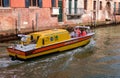 Venice, Italy - May 07, 2018: Typical ambulance sailing along the canals of Venice. Medical boat with doctors to the