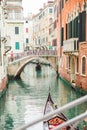 Venice, Italy - May 25, 2019: view of gondolas traffic in canal singer at boat Royalty Free Stock Photo